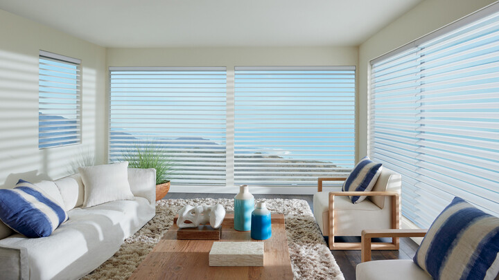 blinds in sitting area coastal view four season room